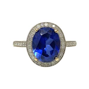 Synthetic Sapphire and Diamond 0.10ct Ring In 9K Yellow Gold